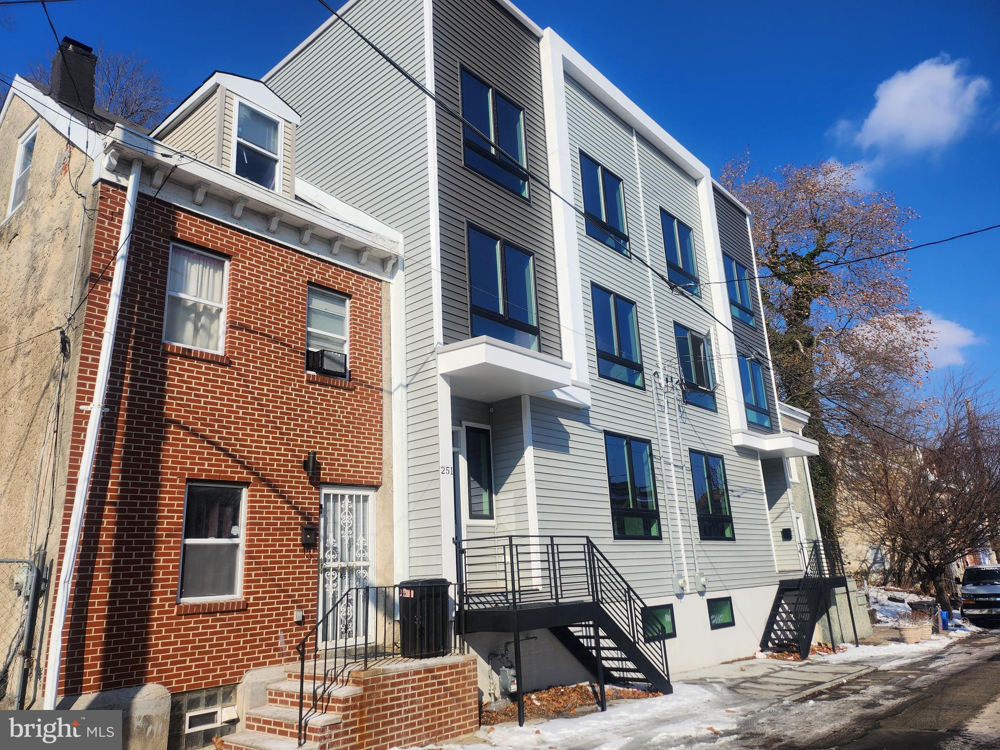 258 East Sharpnack Street Philadelphia, PA 19119 - Photo 3 of 7 Newer residential development project on block.