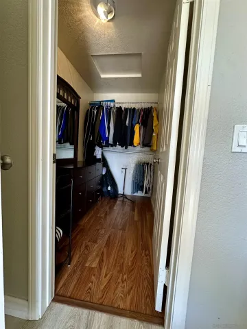 a view of a living room with furniture and a fireplace