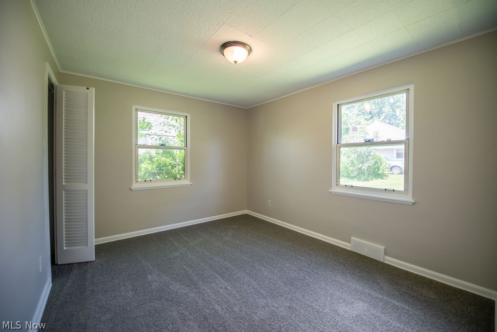 4221 2nd Street Northwest Canton, OH 44708 - Photo 21 of 35 Upper level bedroom