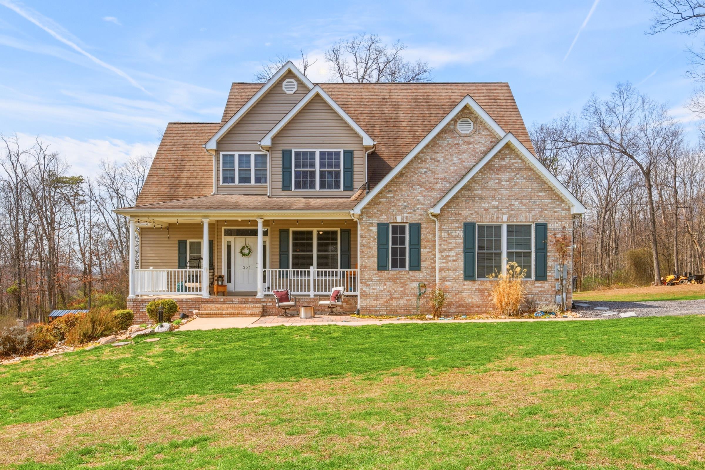 257 Hunter Road Maurertown, VA 22644 - Photo 56 of 61 a front view of a house with garden