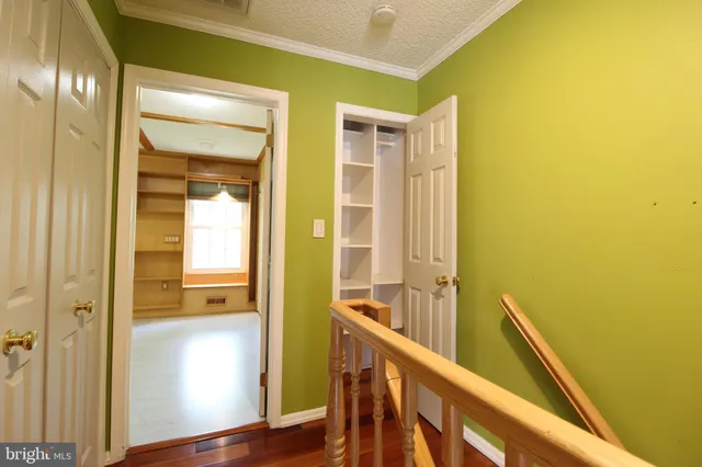 a view of a bathroom with a glass door