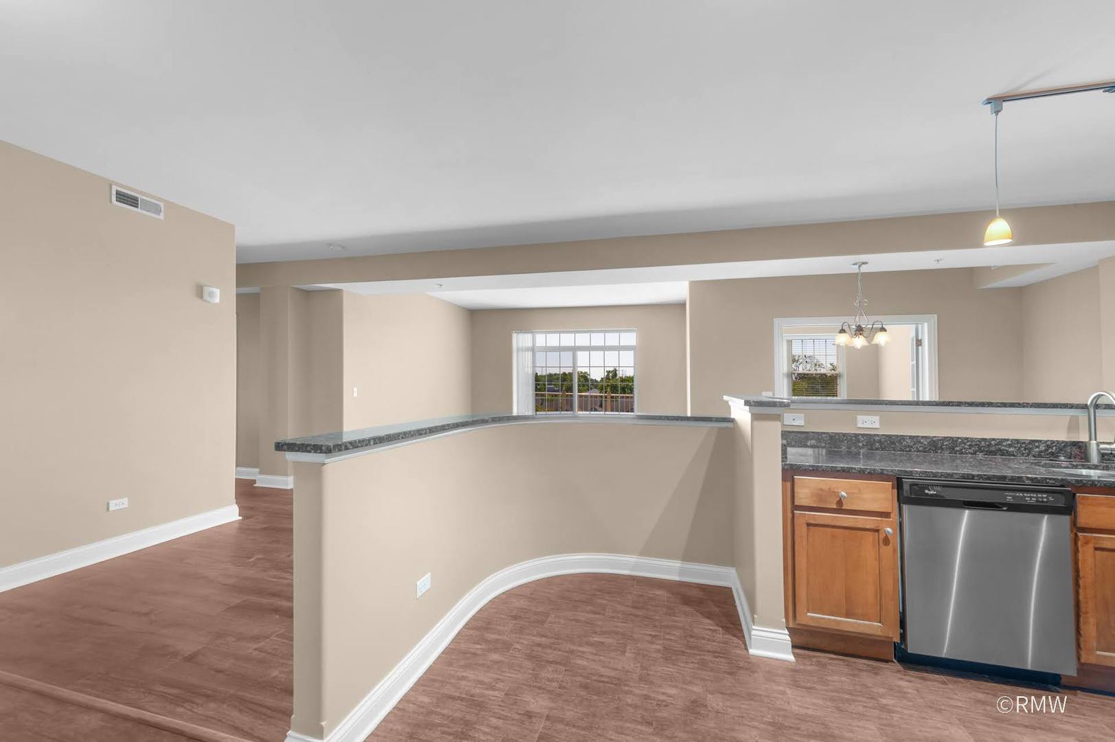 2 Itasca Place, Unit 420 Addison, IL 60143 - Photo 19 of 20 a view of kitchen with furniture and wooden floor