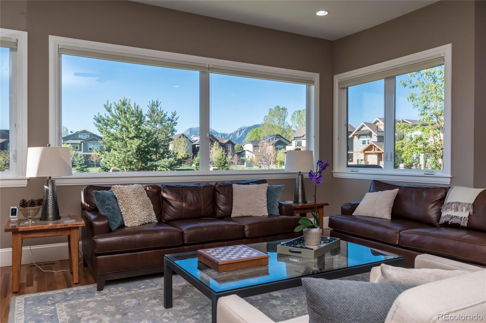4624 Sunnyside Place Boulder, CO 80301 - Photo 16 of 40 a living room with furniture and a large window
