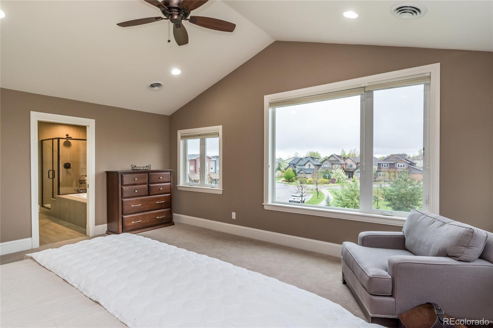 4624 Sunnyside Place Boulder, CO 80301 - Photo 25 of 40 a bedroom with furniture and a large window
