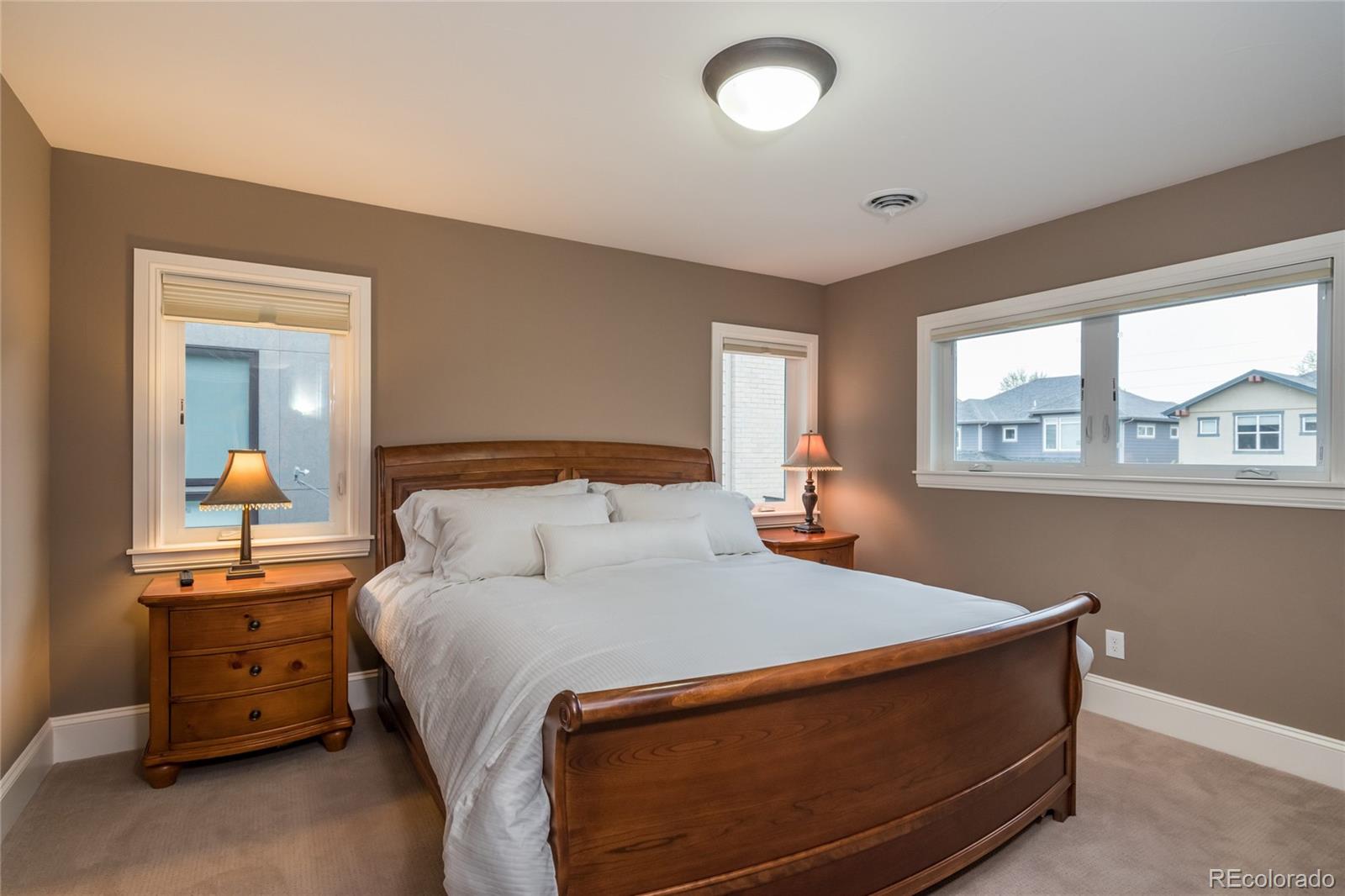 4624 Sunnyside Place Boulder, CO 80301 - Photo 29 of 40 a bed room with a bed and a window