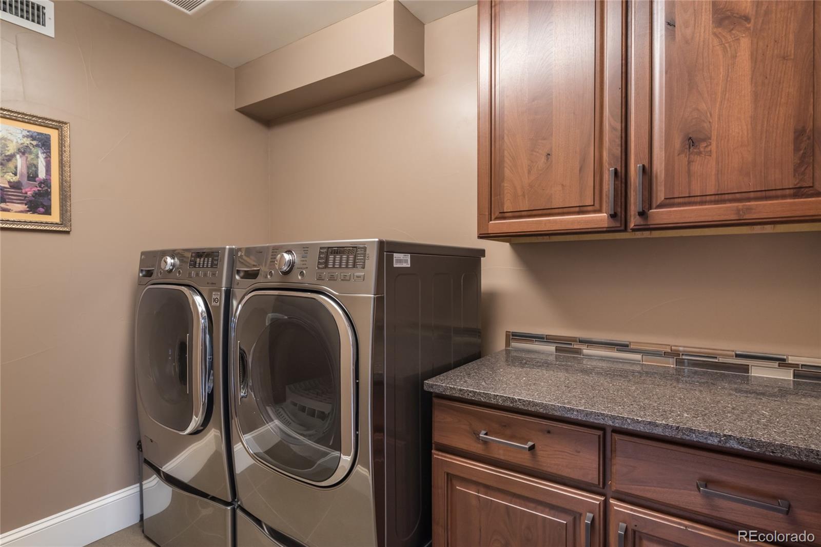 4624 Sunnyside Place Boulder, CO 80301 - Photo 31 of 40 a utility room with dryer and washer