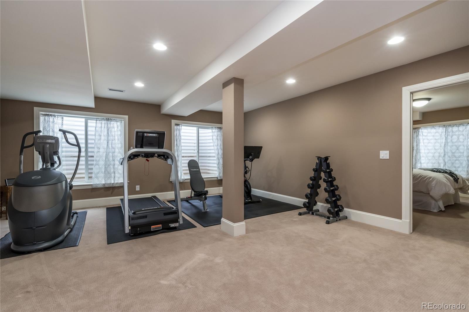 4624 Sunnyside Place Boulder, CO 80301 - Photo 37 of 40 a view of a room with gym equipment and a large window