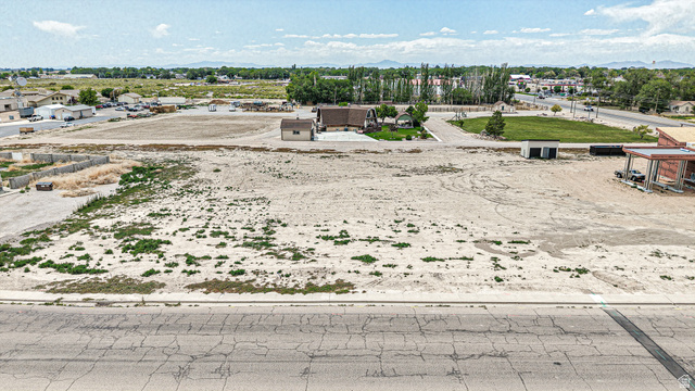 84 White Sage Avenue, Unit 2 Delta, UT 84624 - Photo 8 of 18 Expansive undeveloped lot featuring a level grade and direct road frontage