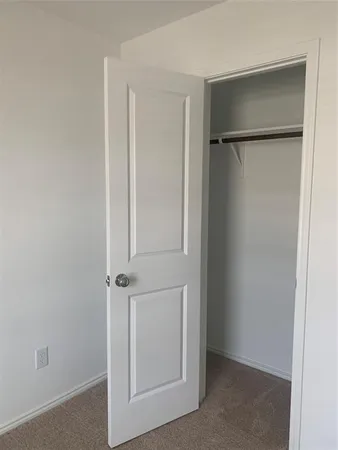 an empty room with closet