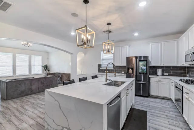 a view of a house with a big yard