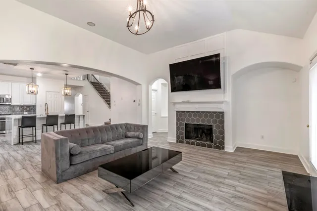 a view of front of house with flowers and flowers