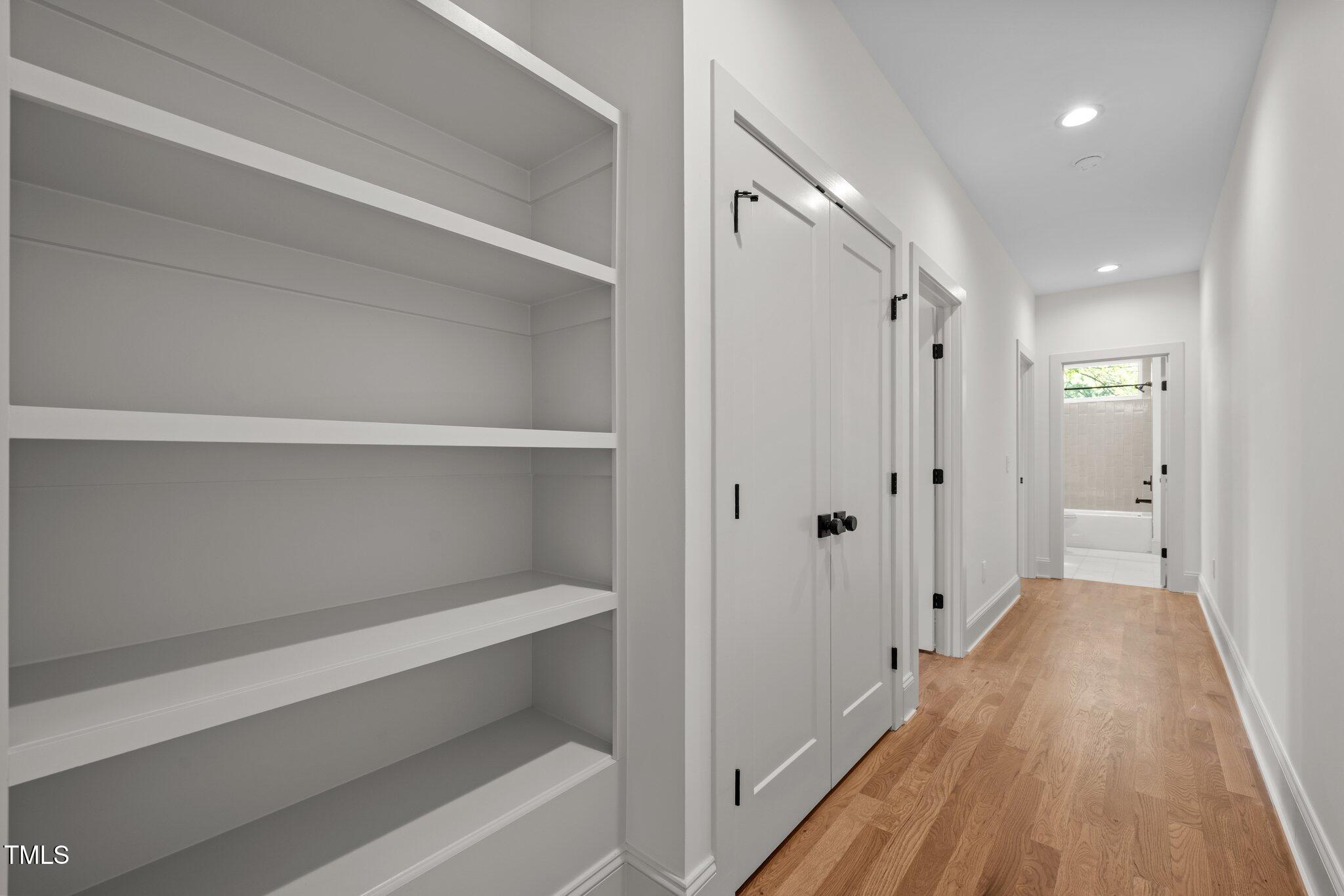 805 Tower Street, Unit 102 Raleigh, NC 27607 - Photo 22 of 36 a view of gallery with wooden floor