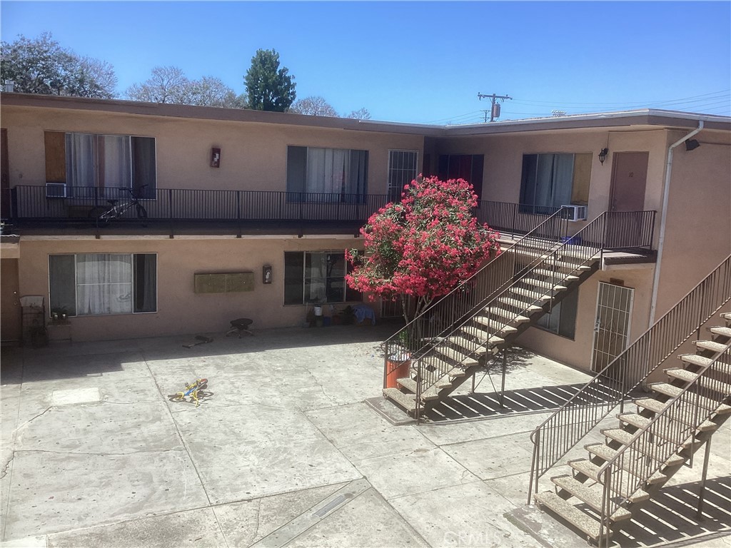 1426 South Minnie Street Santa Ana, CA 92707 - Photo 5 of 9 a front view of a house with a yard