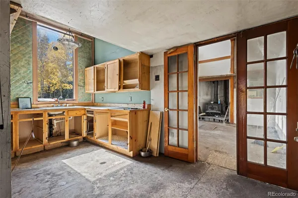 a kitchen with a sink and a window