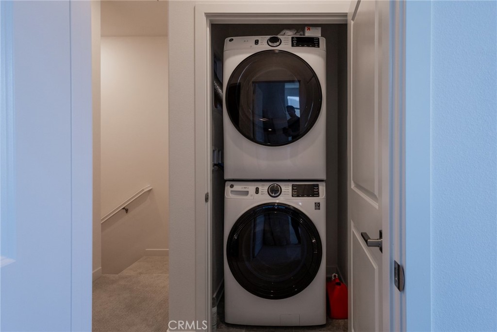 2640 Sprout Lane, Unit 104 Corona, CA 92883 - Photo 15 of 20 a close up view of a washer and dryer