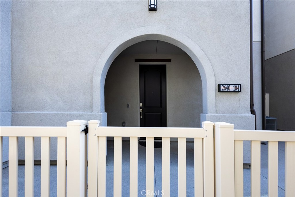 2640 Sprout Lane, Unit 104 Corona, CA 92883 - Photo 17 of 20 a view of a entrance door of a house
