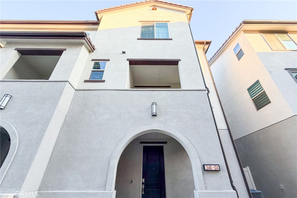 2640 Sprout Lane, Unit 104 Corona, CA 92883 - Photo 20 of 20 a view of living room with a fireplace and wooden floor