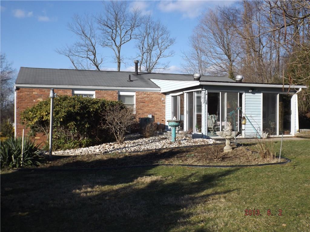 6941 Mellon Road Export, PA 15632 - Photo 2 of 25 Rear of home with 15x13 Additional 4 Season Sun room with gas heater.