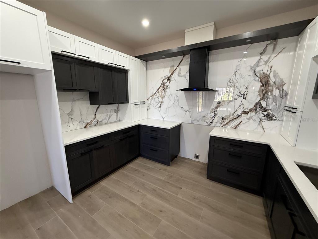 47 Brig Circle East Placida, FL 33946 - Photo 16 of 24 a spacious bathroom with a double vanity sink and a mirror