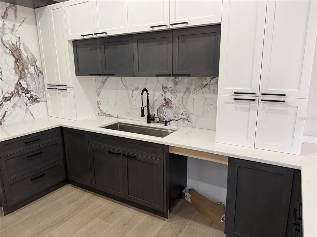 47 Brig Circle East Placida, FL 33946 - Photo 19 of 24 a kitchen with a sink and cabinets