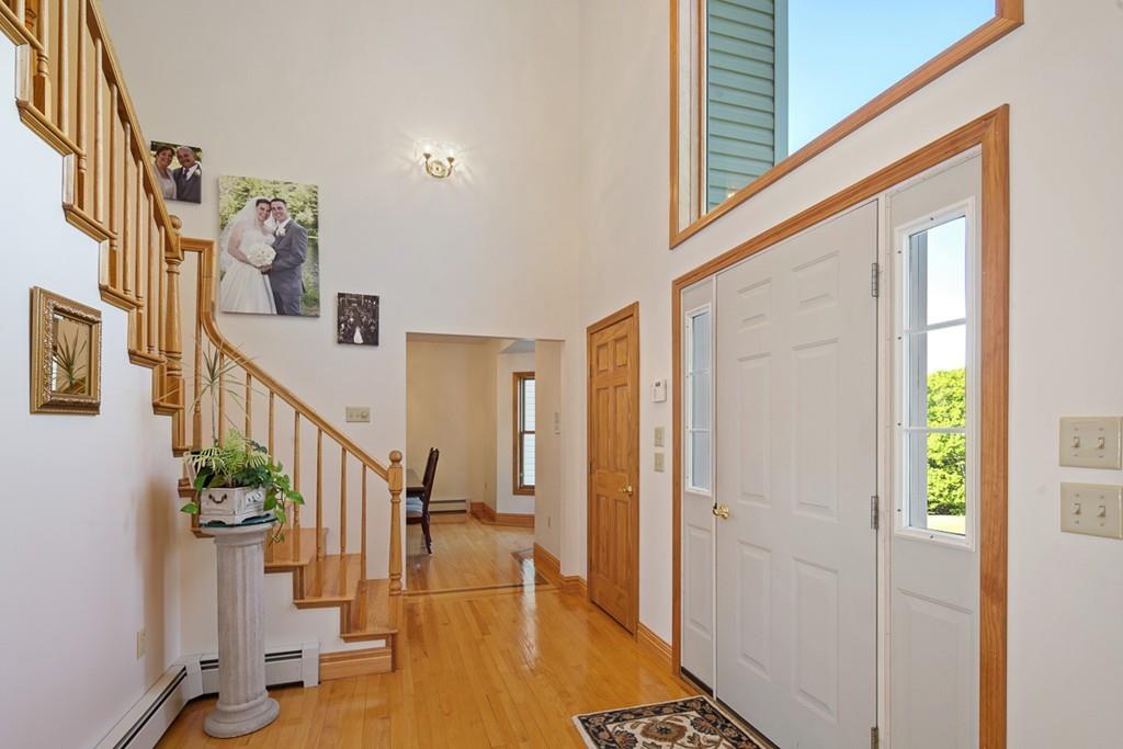 16 Crosby Road Ashburnham, MA 01430 - Photo 5 of 42 a view of entryway and hall with wooden floor