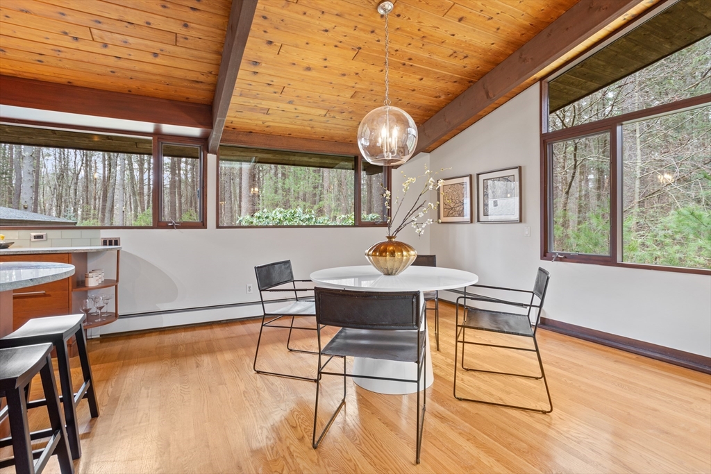 69 Long Ridge Road Carlisle, MA 01741 - Photo 12 of 42 a view of a dining room with furniture window and wooden floor