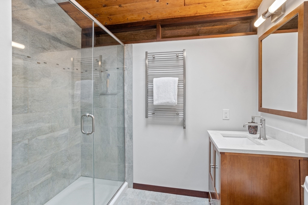 69 Long Ridge Road Carlisle, MA 01741 - Photo 23 of 42 a bathroom with a shower and a sink