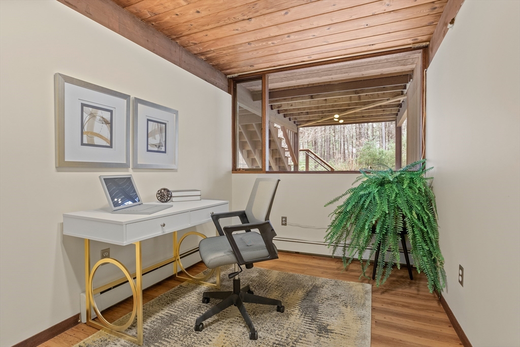 69 Long Ridge Road Carlisle, MA 01741 - Photo 29 of 42 a workspace with furniture and a potted plant