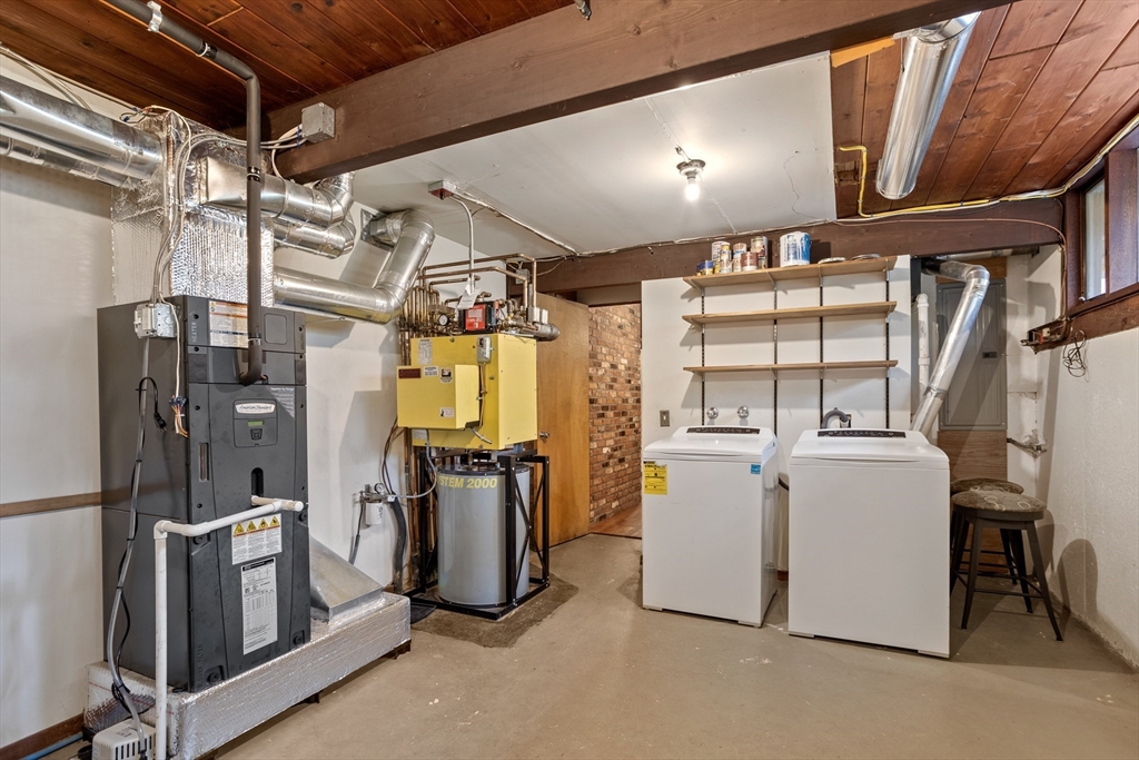69 Long Ridge Road Carlisle, MA 01741 - Photo 34 of 42 a view of storage and utility room with washer and dryer