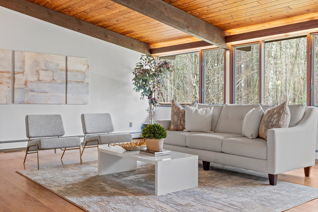 69 Long Ridge Road Carlisle, MA 01741 - Photo 6 of 42 a living room with furniture and a large window