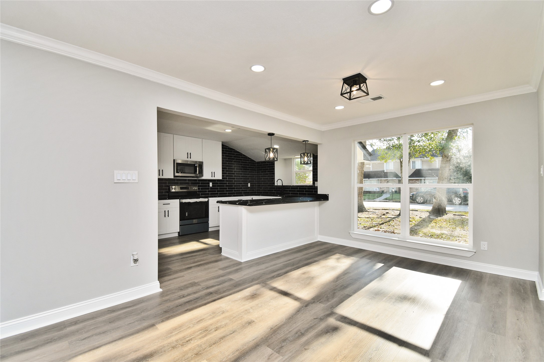 2035 Round Spring Drive Houston, TX 77339 - Photo 24 of 33 Kitchen/Living Room