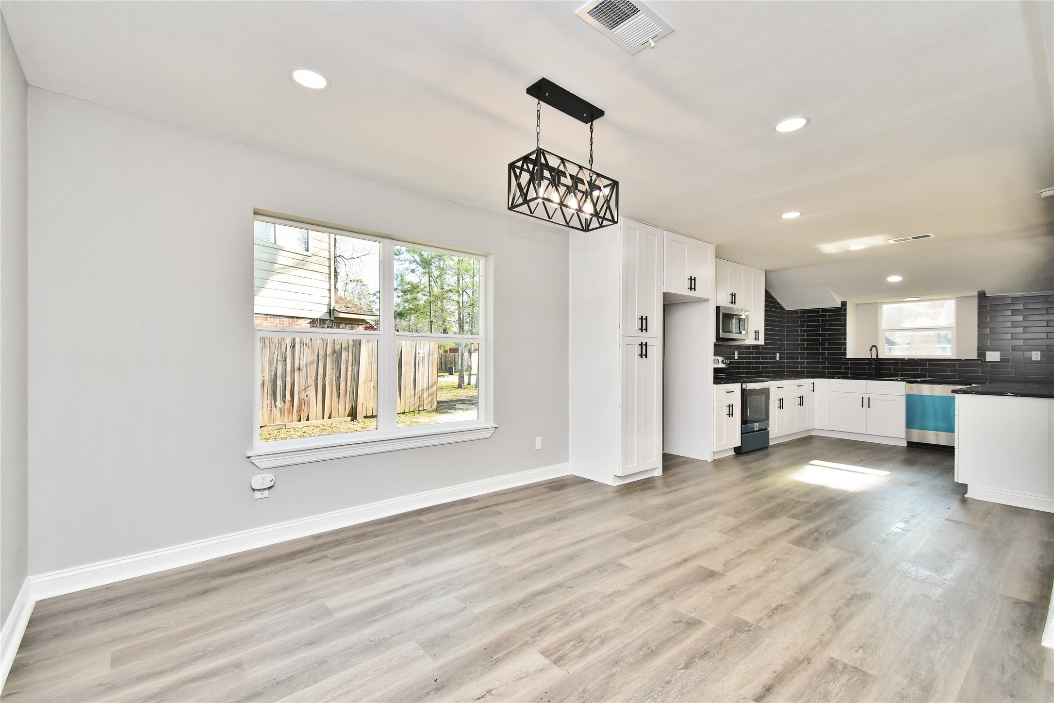 2035 Round Spring Drive Houston, TX 77339 - Photo 27 of 33 Kitchen/Living Room