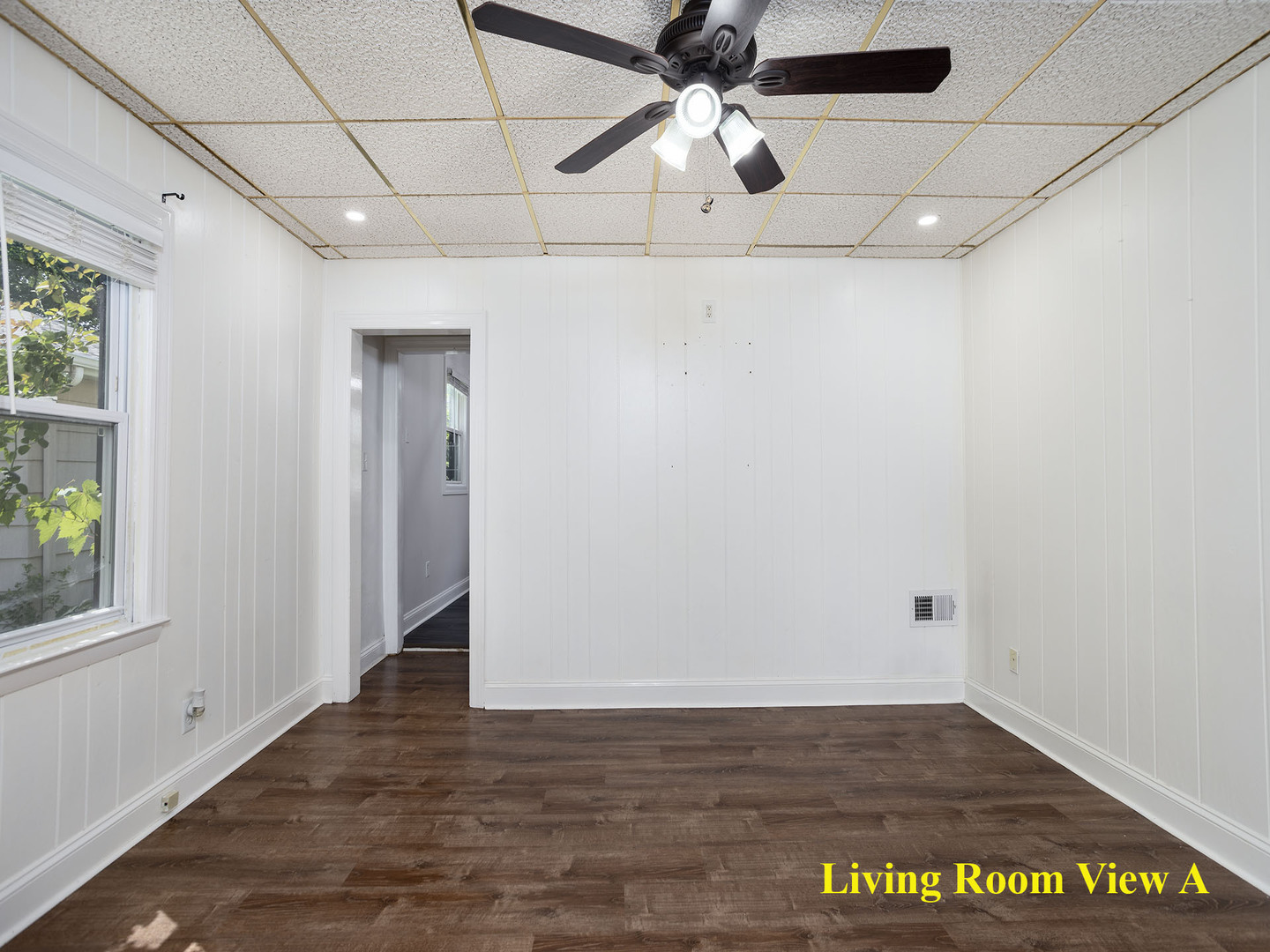 17836 Wildwood Avenue Lansing, IL 60438 - Photo 5 of 22 a view of an empty room with a window