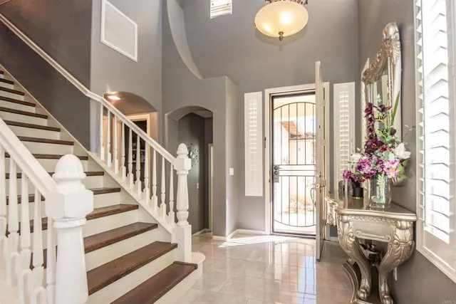 a view of a livingroom with furniture and windows