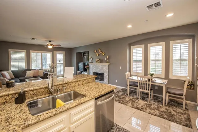 a view of a hallway with wooden floor and closet