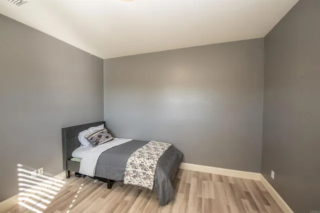 a spacious bathroom with sink shower bathtub and mirror