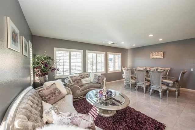 a living room with furniture and a couch