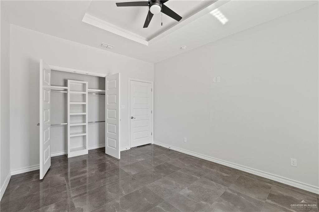 1003 Short Road San Juan, TX 78589 - Photo 7 of 20 an empty room with closet and windows