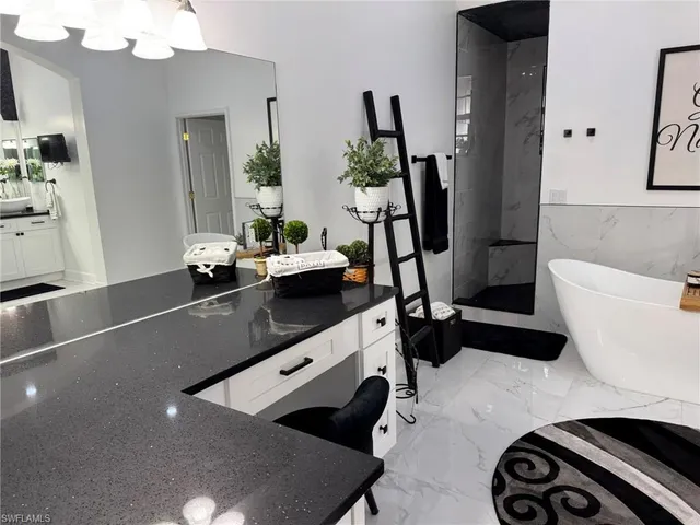 a view of livingroom and living room with furniture