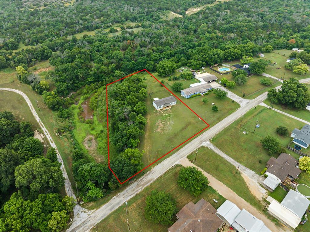 6065 Timber Trail Azle, TX 76020 - Photo 25 of 33 an aerial view of residential houses with outdoor space and street view