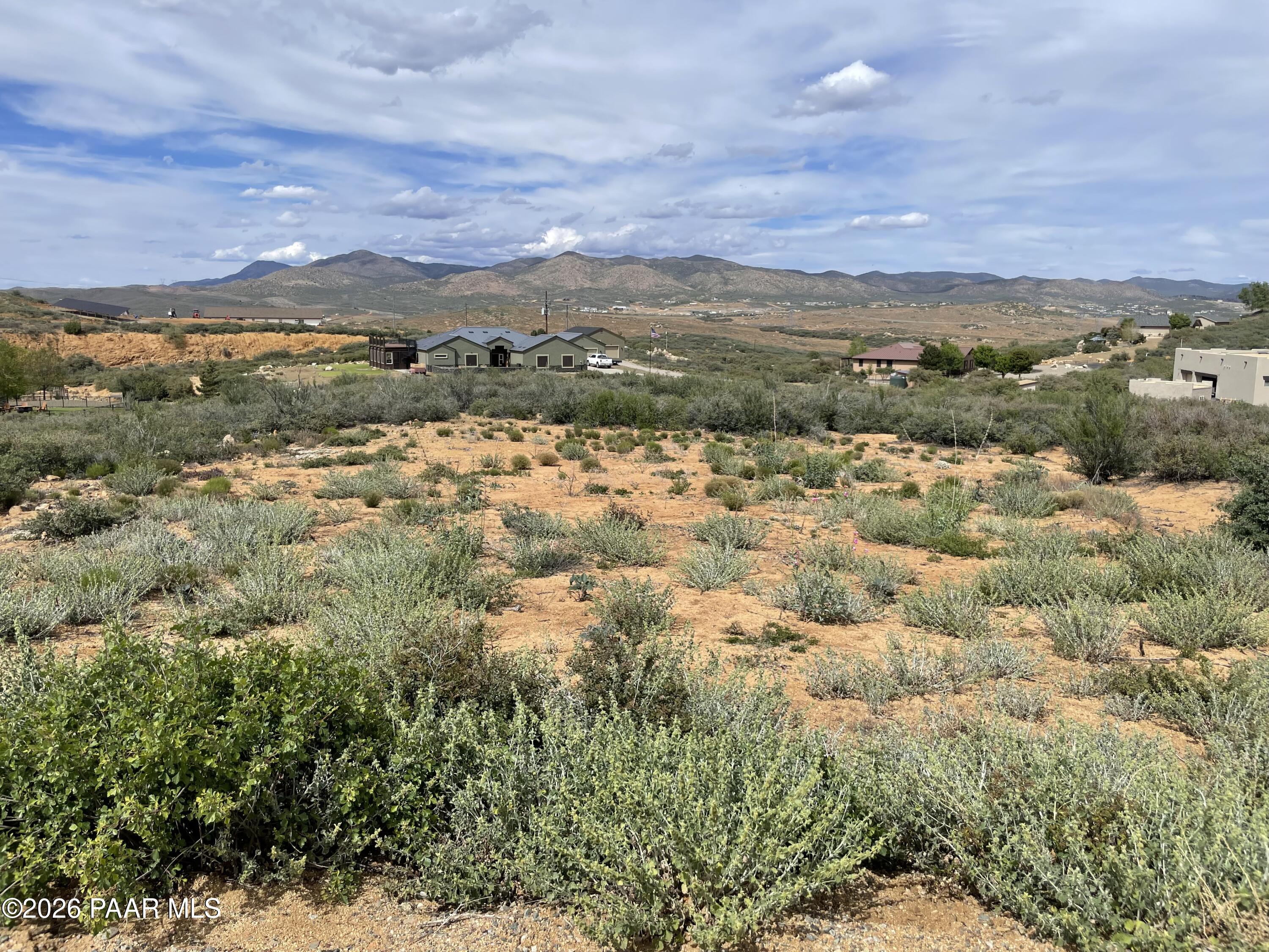0 East True Grit Road Dewey, AZ 86327 - Photo 5 of 9 an aerial view of houses covered in trees