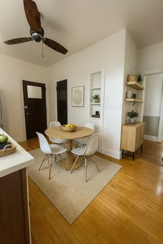 a view of a workspace with furniture