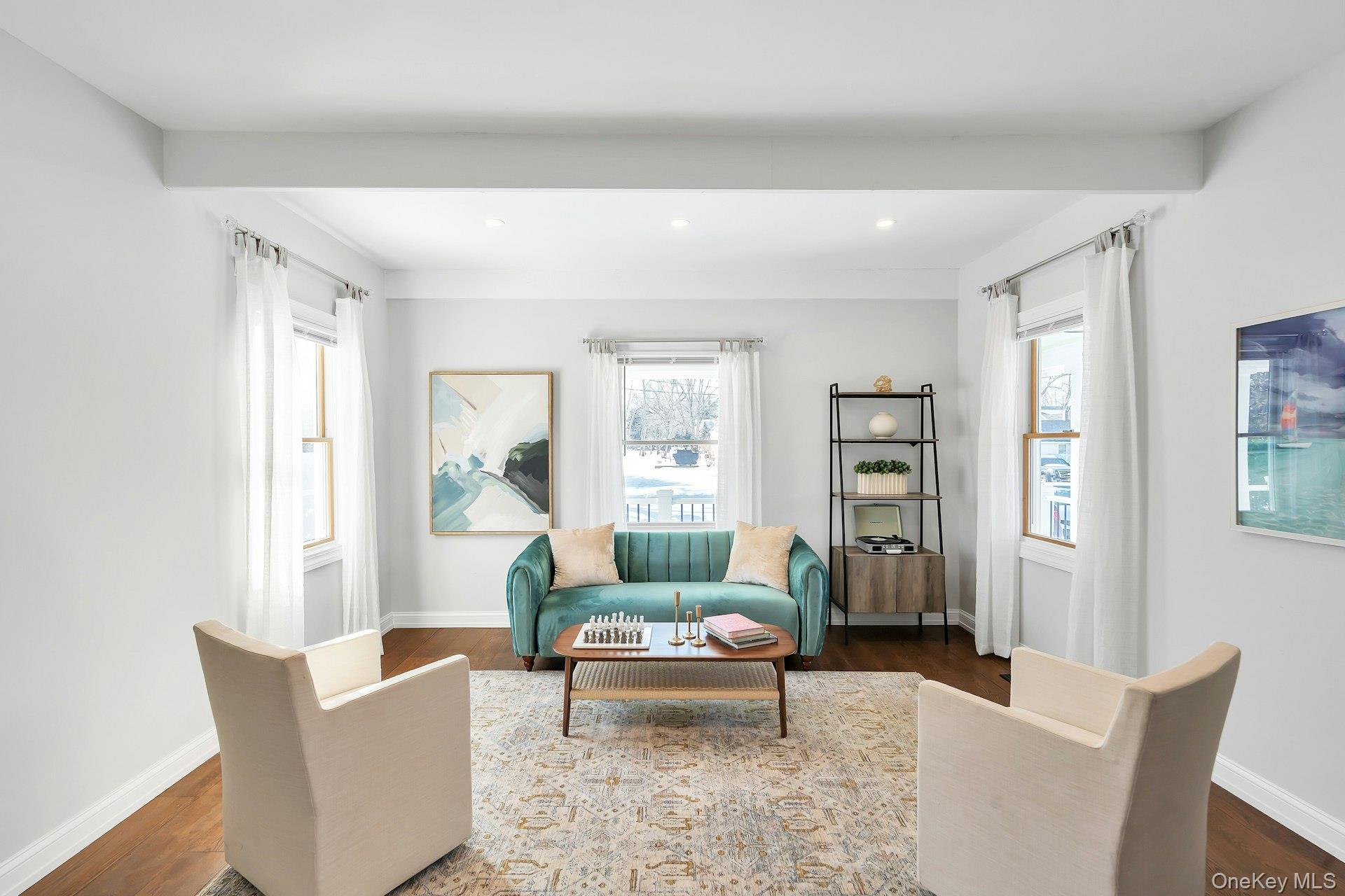 235 Cemetery Road East Marion, NY 11939 - Photo 12 of 37 Large living room perfect for family gatherings. 3 windows.