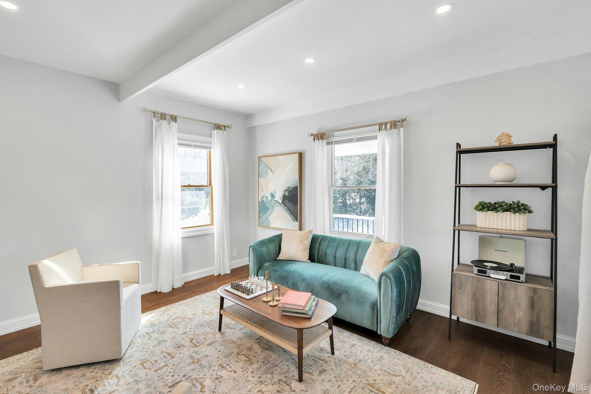 235 Cemetery Road East Marion, NY 11939 - Photo 13 of 37 Full of light with new Andersen windows and original trim details.