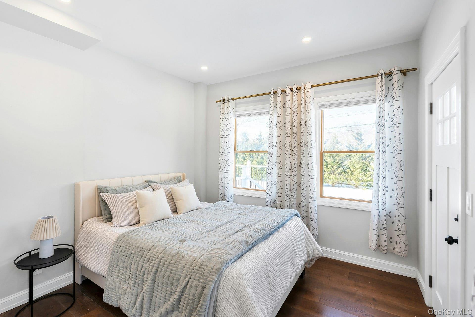 235 Cemetery Road East Marion, NY 11939 - Photo 15 of 37 First floor large bedroom with separate entrance and ensuite bathroom perfect for guests.