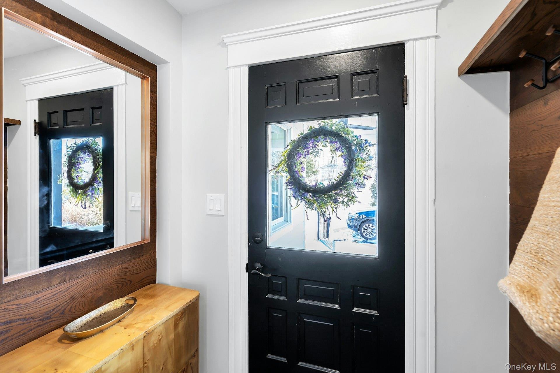 235 Cemetery Road East Marion, NY 11939 - Photo 34 of 37 Entrance foyer with wall of coat hooks.
