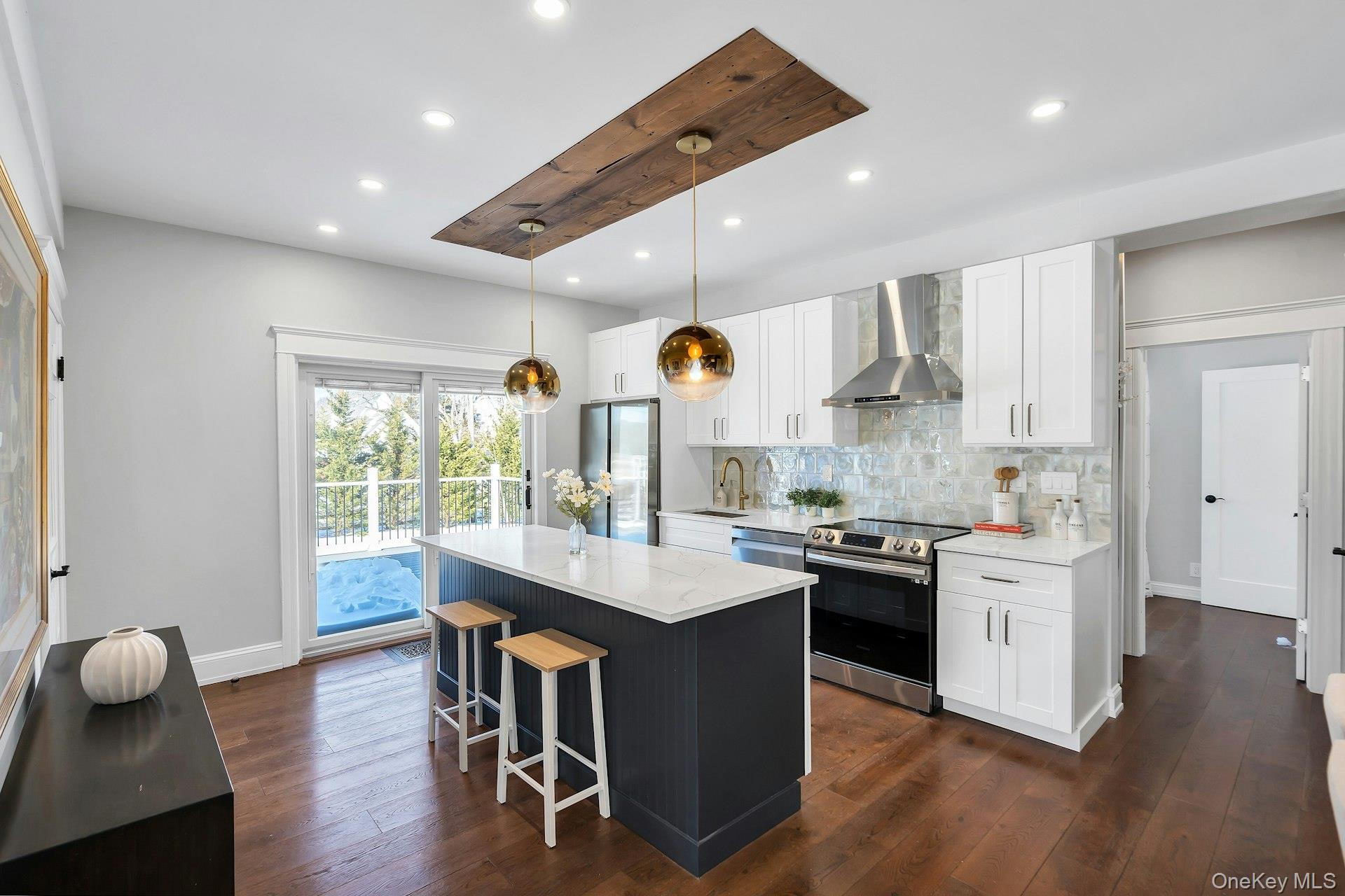 235 Cemetery Road East Marion, NY 11939 - Photo 8 of 37 Charming open kitchen with wood details, quartz countertops and 9 FT ceilings.
