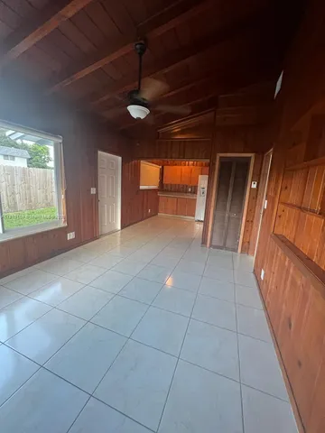 a view of a livingroom with a furniture and window