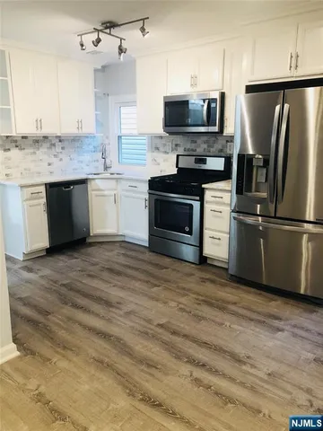 a bathroom with a shower and a bathtub