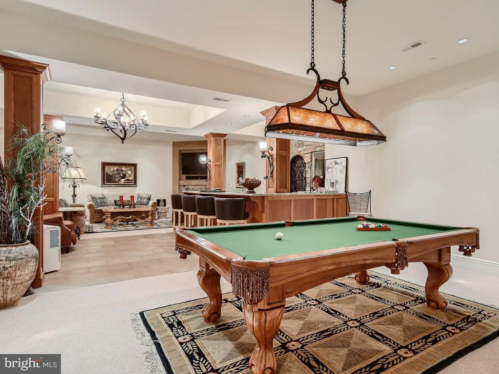 10720 Stevenson Road Stevenson, MD 21153 - Photo 23 of 64 Lower level pool table area, bar and great room